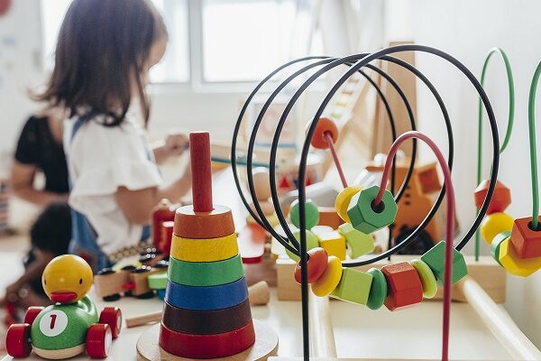 Young girl playing with educational toys Young girl playing with educational toys